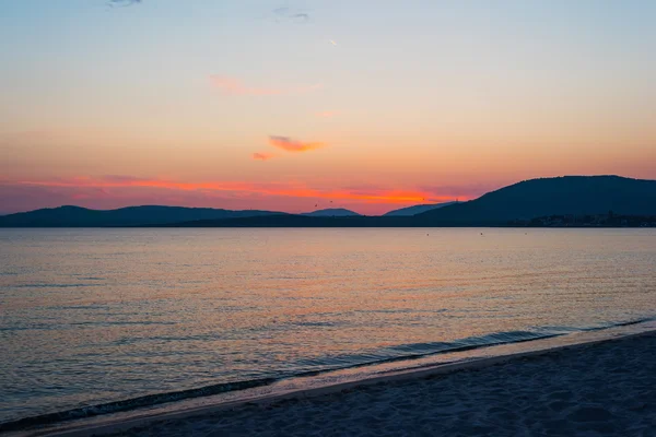 Ciel orange sur Alghero au coucher du soleil — Photo