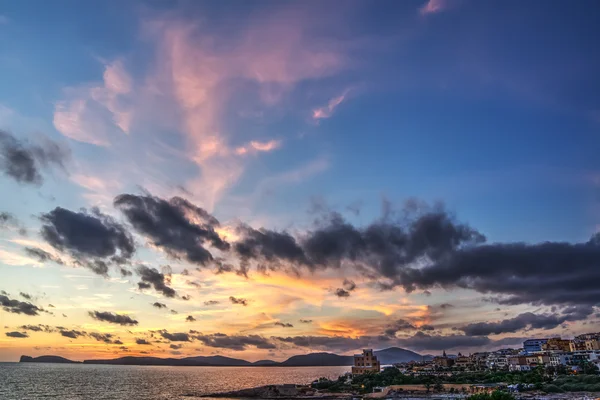 Colorful sky over Alghero at sunset — Stock Photo, Image