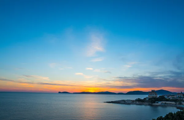 Clear sky over Alghero at sunset — Stock Photo, Image