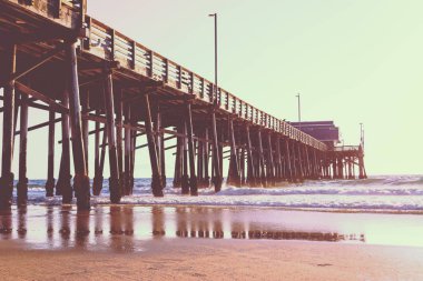 Newport Beach pier in vintage tone clipart