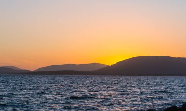 Alghero'da turuncu günbatımı