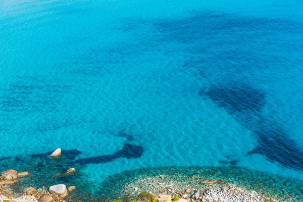 Blue sea in Porto Giunco — стокове фото