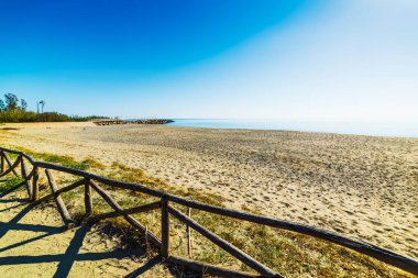 Marina di Cardedu under a blue sky