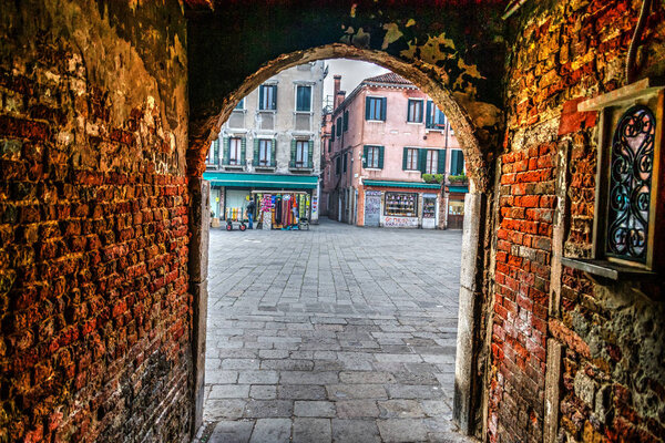 Rustic arch in Venice, Italy