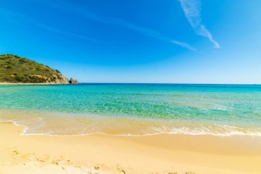 Sandy shore in Cala Monte Turno