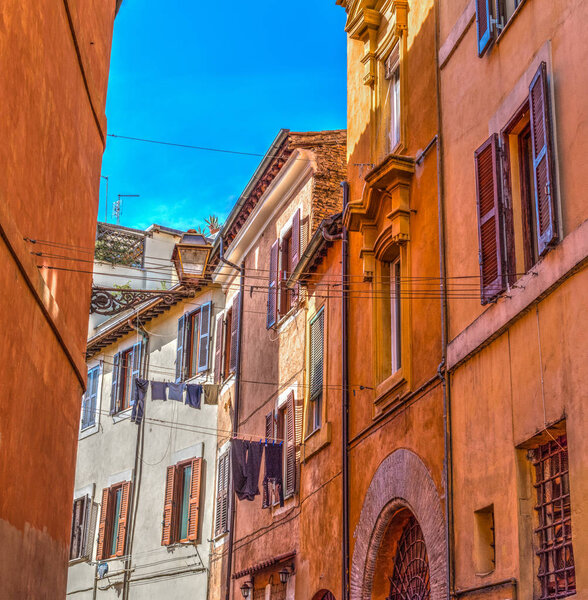 Orange facades in Trastevere. Rome, Italy