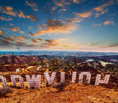 Hollywood sign seen from behind at sunset clipart