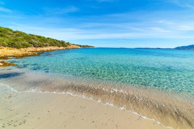 Turquoise sea in Andreani cove in Caprera