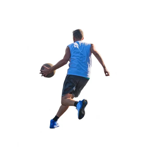 Basketball player dribbling to the basket — Stock Photo, Image