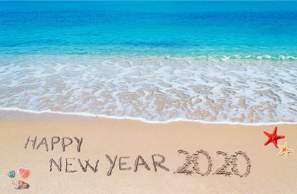 Happy new year 2020 on the beach — Stock Photo, Image