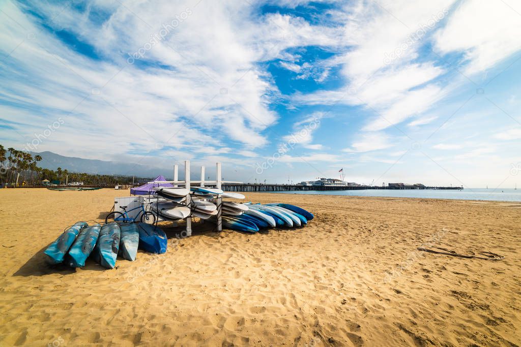 Bike, kayaks and surfboards in Santa Barbara shore