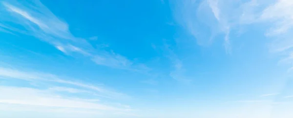 Blue sky with small clouds in the springtime. Sardinia, italy
