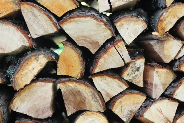 Heap firewood background — Stock Photo, Image