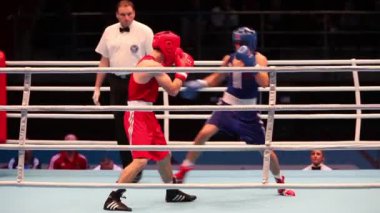 Boks maçı kırmızı - Gashi ö, Almanya; Mavi - Erdemir T., Türkiye