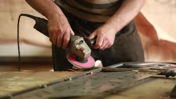 Hands  using  angle grinder — Stock Video