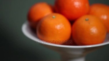 kase portakal, Noel Baba şapkası ön planda turuncu meyve