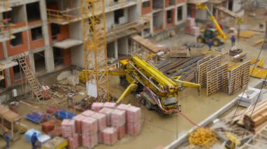 Truck  with concrete pump  on construction site  top view, time lapse