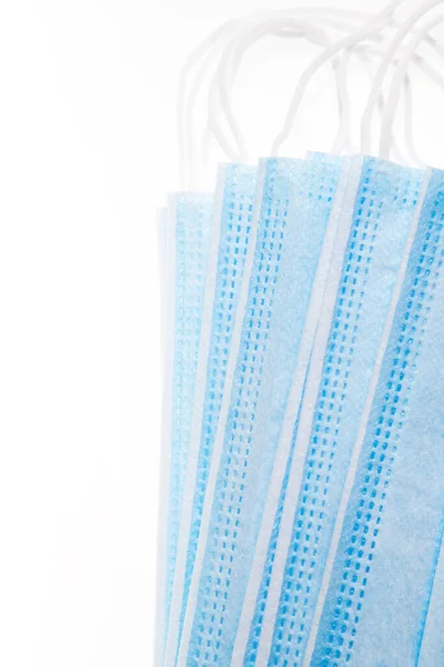 Korona virüsüne karşı korunmak için antiviral tıbbi maskeler.