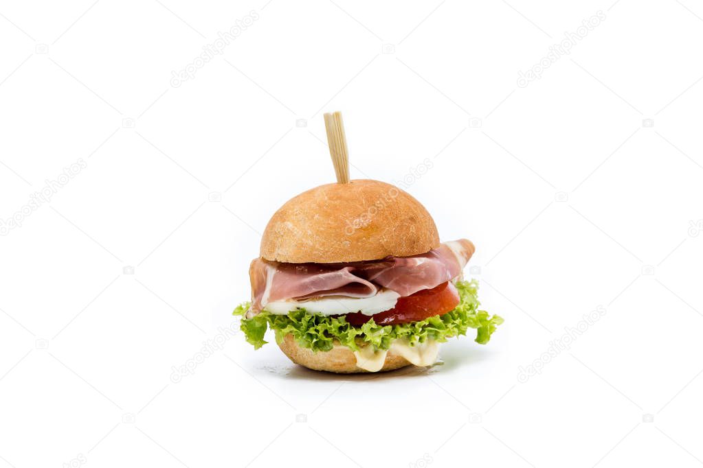 small hamburger canapes on white