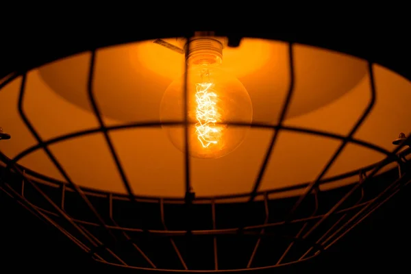 Closeup view of contemporary light fixture in dark room — Stock Photo, Image