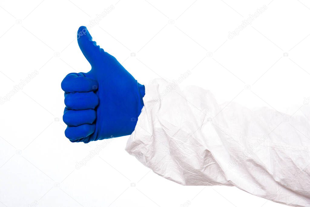 Doctors or nurses hands in navy gloves giving thumbs up isolated on white background