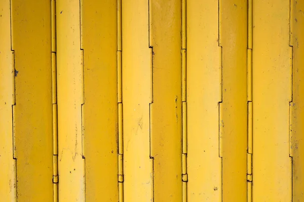Κίτρινο σκουριασμένο διαφράγματος πόρτα φόντου — Φωτογραφία Αρχείου
