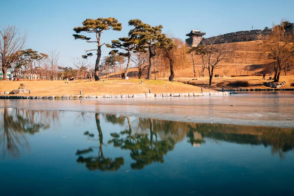 Hwaseong Fortress and frozen pond at winter in Suwon, Korea — Stock Photo, Image
