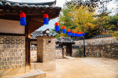 Korean traditional house at autumn in Seoul, Korea clipart