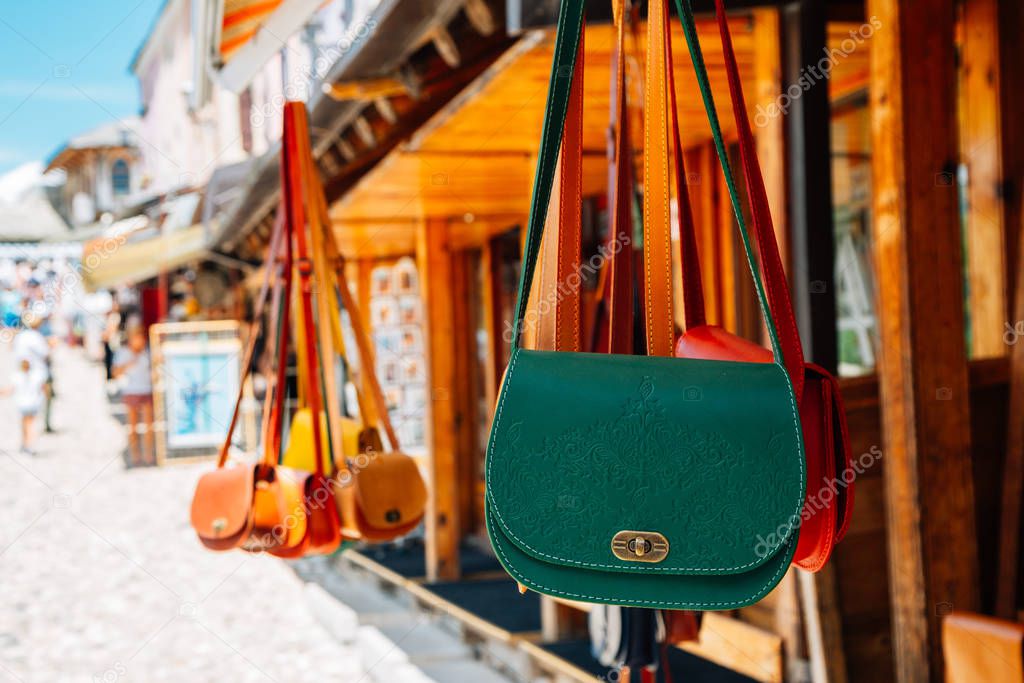 Old town souvenir shop colorful leather bags in Mostar, Bosnia and Herzegovina