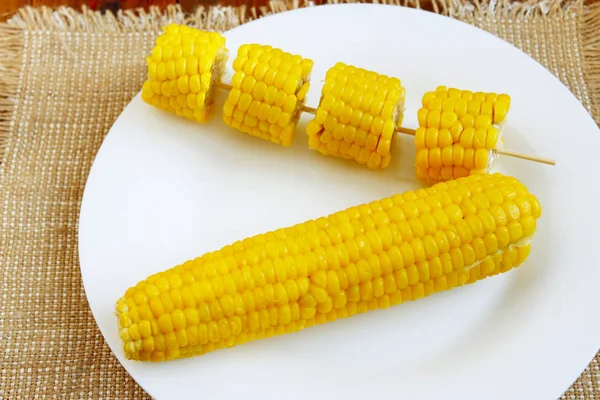 Dish with boiled corns — Stock Photo, Image