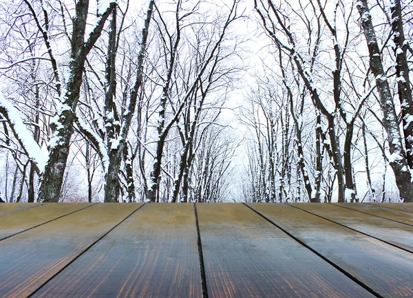 Holzbretter mit Winterlandschaft — Stockfoto