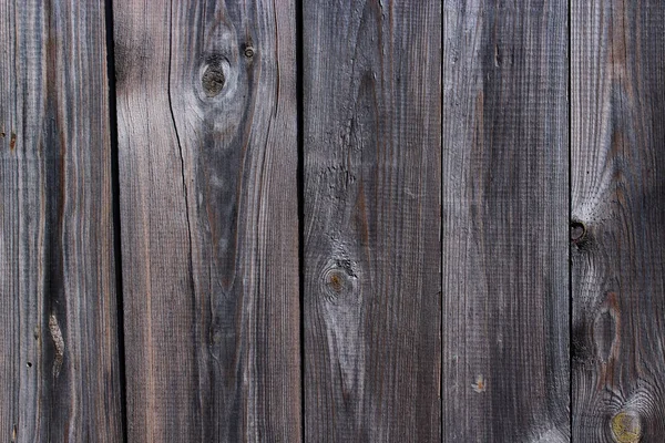 Textur aus dunklen Holzbrettern — Stockfoto