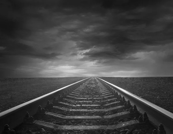 Rails going away into the gloomy distance — Stock Photo, Image