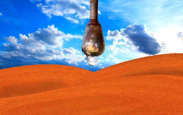 Drop of water hanging above the desert — Stock Photo, Image