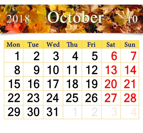 Календар на жовтень 2018 року з жовтим листям — стокове фото