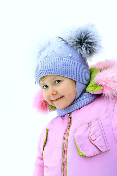 Portrait of baby in amusing winter cap — Stock Photo, Image