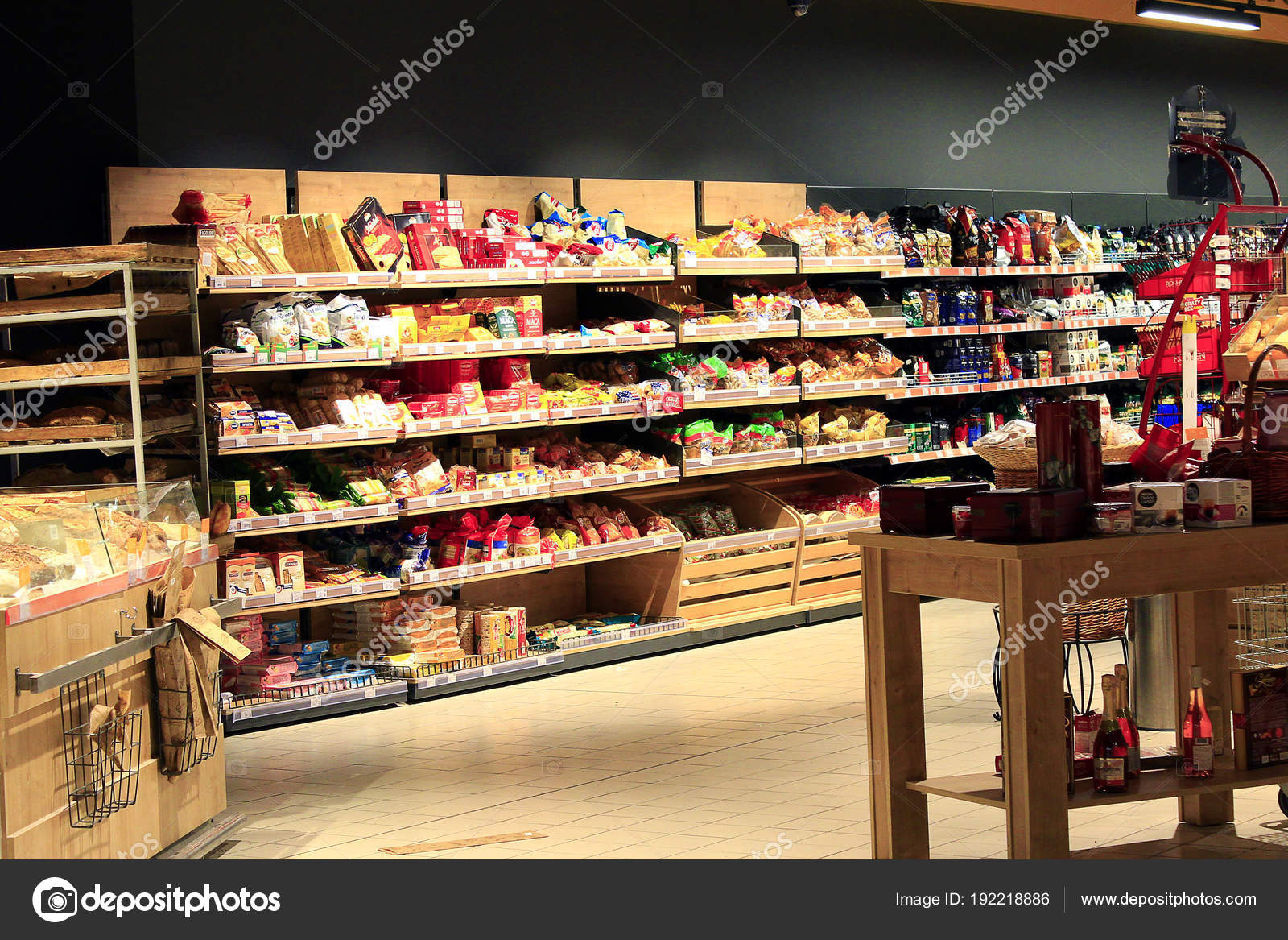 Grocery store with rich assortment of goods. Tea coffee bread Stock