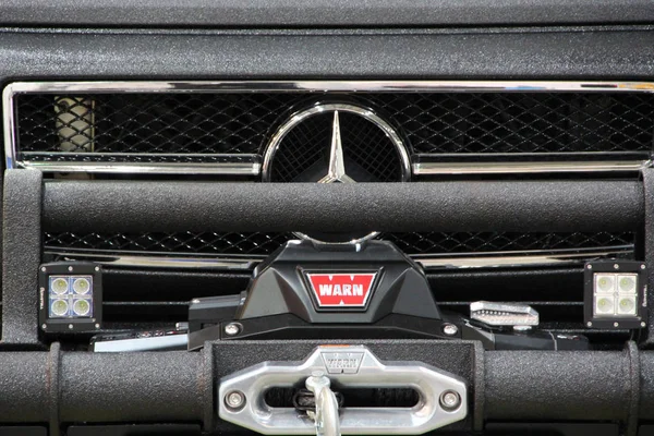 Emblem of Mercedes-Benz G-Class and radiator close up — стокове фото