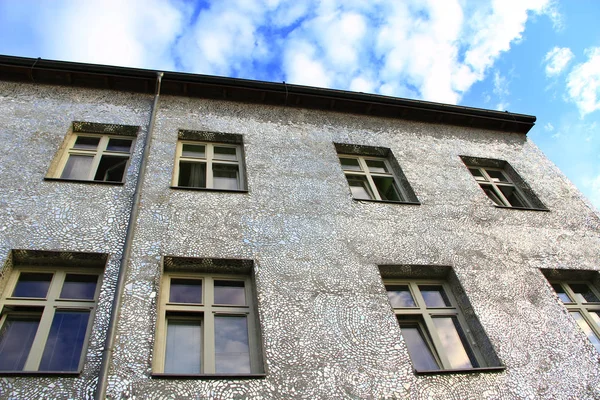 Building with mirrored walls. Facade of building made of mirror fragment