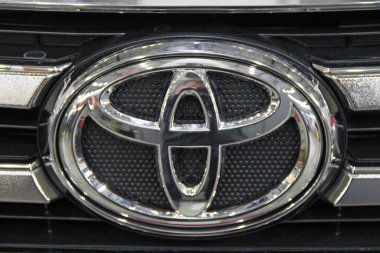 Kyiv / Ukraine. 09 March 2019: Modern Toyota car icon is presented at exhibition in Kiyv. Japanese brand auto Toyota. Sign of Toyota