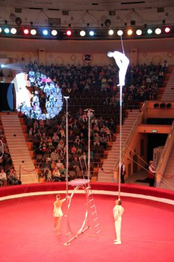 Gomel / Belarus - May 20, 2018 : Circus number. Equilibrists show tricks during performance of gymnasts in circus. Gymnasts equilibrists in circus