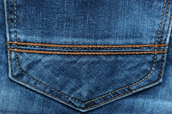 Jeans en denim bleu texture et fond avec coutures — Photo