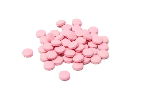 Růžové pilulky tablety léku, samostatný — Stock fotografie