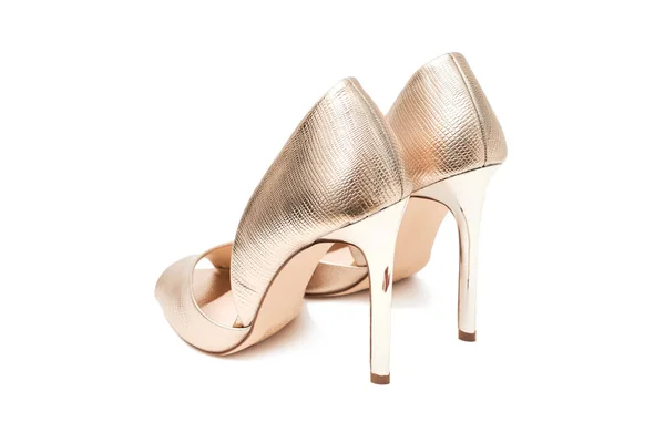 Golden high heels shoes — Stock Photo, Image