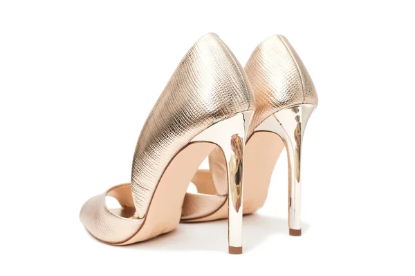 Gouden hoge hakken schoenen — Stockfoto