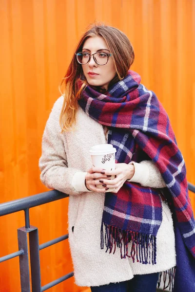 Girl in glasses and blanket scarf with Scottish cell — Stock Photo, Image