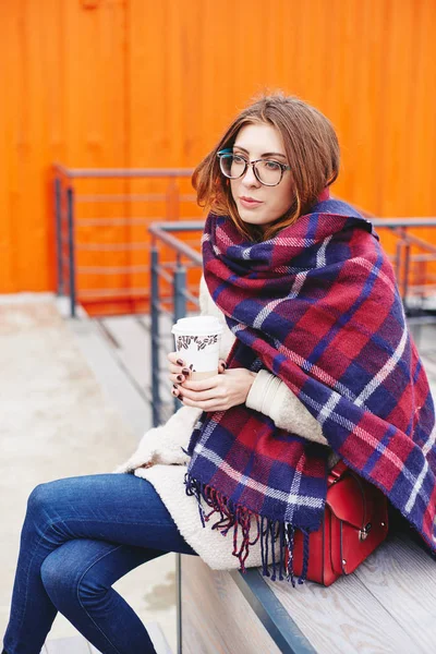Girl in glasses and blanket scarf with Scottish cell — Stock Photo, Image