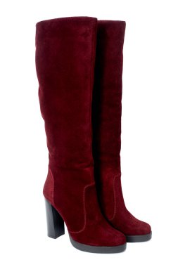 Süet deri üzerinde beyaz arka plan izole kadın kış yüksek topuk çizmeler