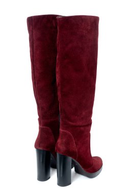 Süet deri üzerinde beyaz arka plan izole kadın kış yüksek topuk çizmeler