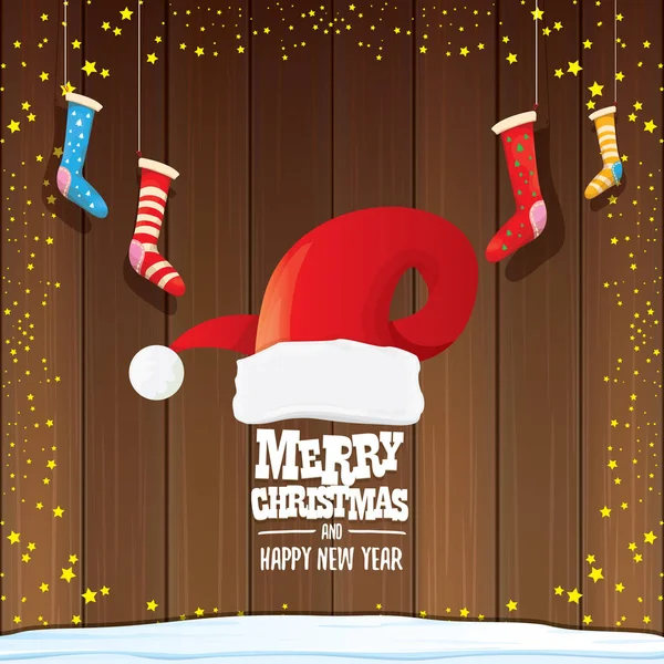 Vector red Santa hat with christmas socks and greeting text Merry Christmas and Happy new year on wooden background. — Stock Vector